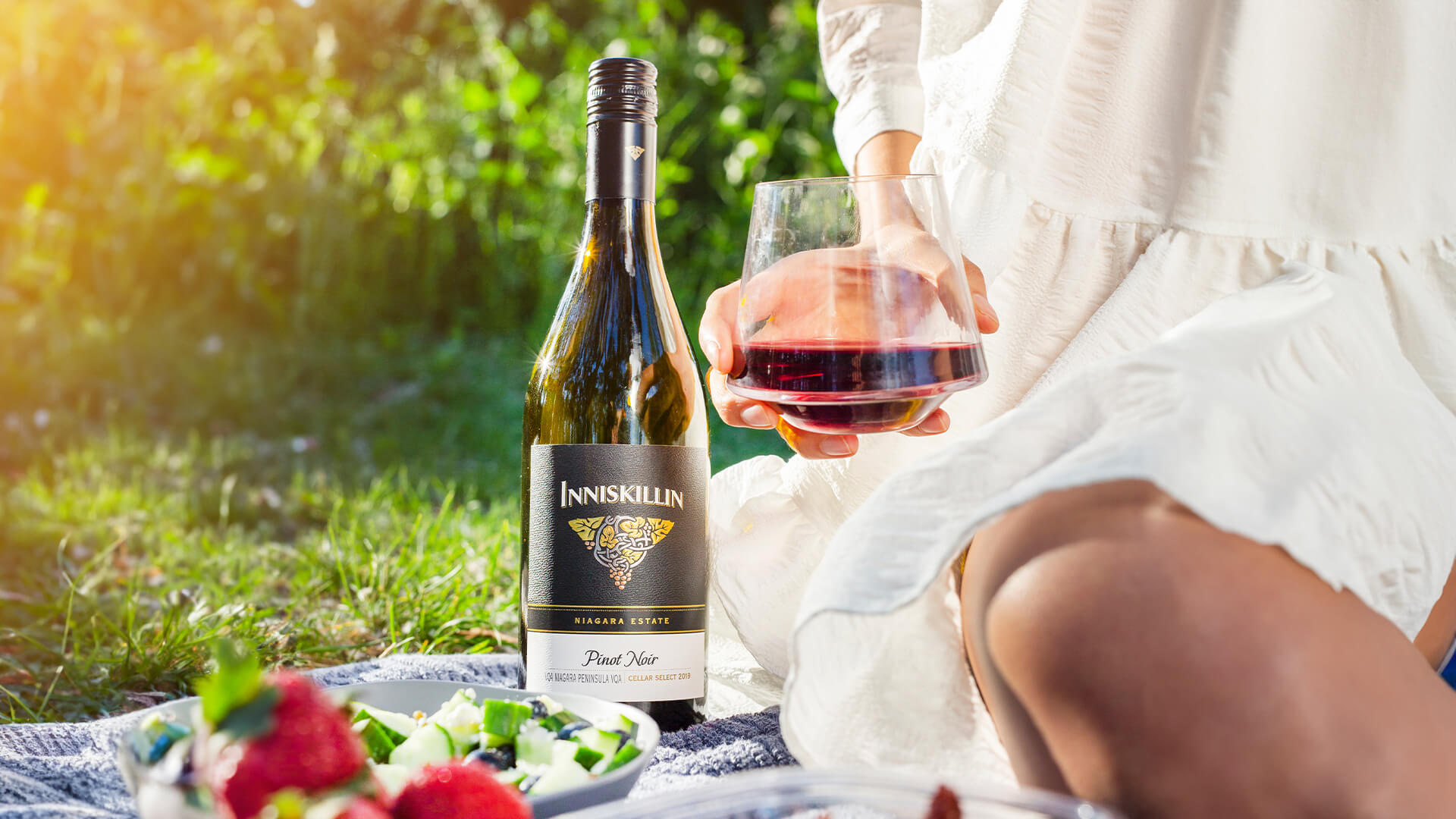 A bottle of Inniskillin Pinot Noir being enjoyed.